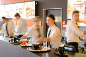 Hotel F&B team in action during busy service — restaurant and Food & Beverage staff training consultancy